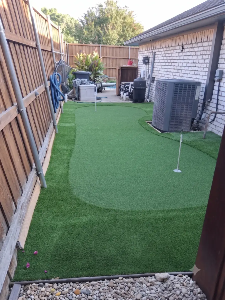 After: side yard with artificial turf and putting green in Dallas, TX